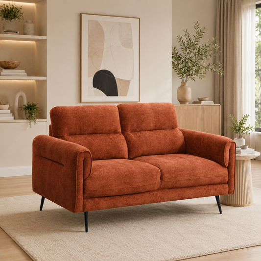 Two-seat loveseat sofa in rust-orange fabric