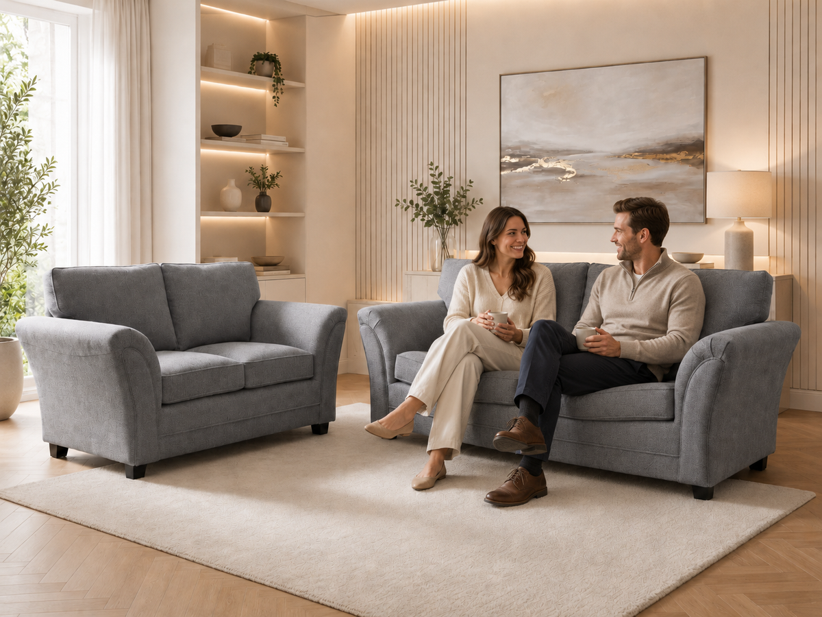 2 gray two-seater loveseat sofas