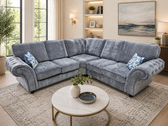 Gray sectional sofa with a round coffee table