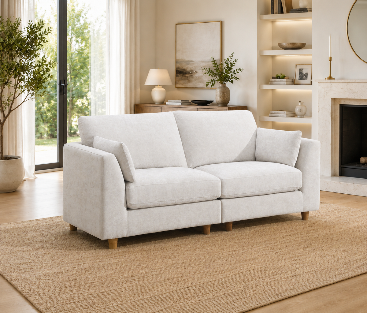 Light beige upholstered sofa with wooden legs