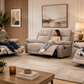 Three light gray upholstered reclining sofas 