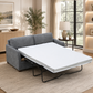 A gray upholstered sleeper sofa with white mattress