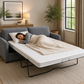 A gray upholstered sleeper sofa with white mattress