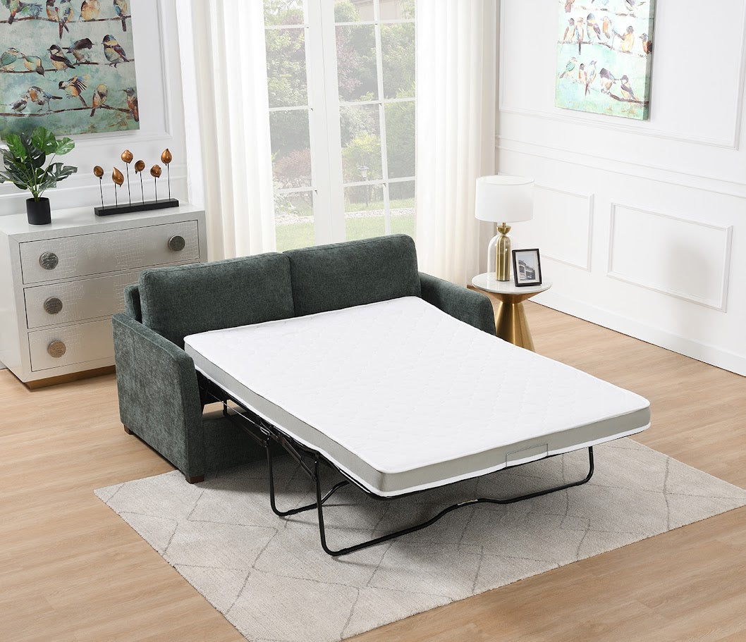 Sofa bed in a living room with a white mattress
